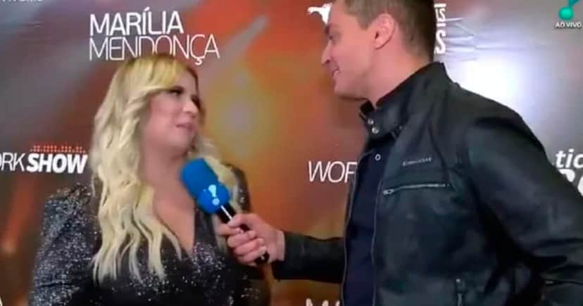 Marília Mendonça e Leo Dias no TV Fama (Foto: Reprodução) Marília Mendonça e Leo Dias no TV Fama (Foto: Reprodução)
