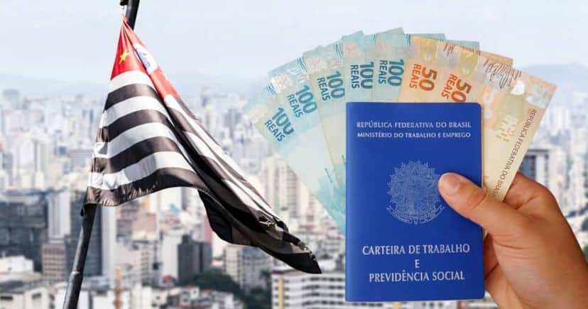 Bandeira do Estado de São Paulo e, pessoa segurando carteira de trabalho e notas de real (Fotos: Canva) Bandeira do Estado de São Paulo e, pessoa segurando carteira de trabalho e notas de real (Fotos: Canva)